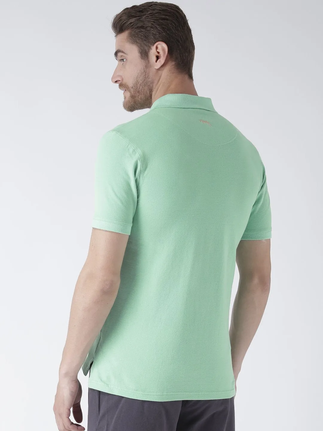 Men Green Solid Polo Collar T-Shirt